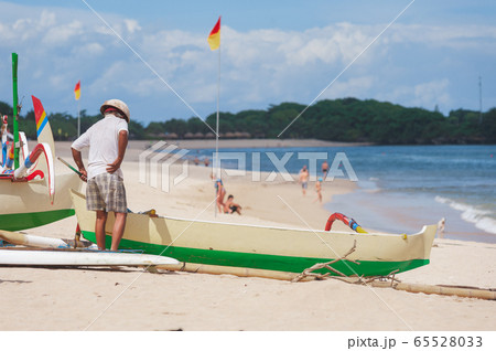 Tropical landscape, beach view with beautiful palm trees 65528033