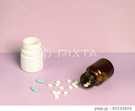 Home treatment. Different pill bottles 65533929