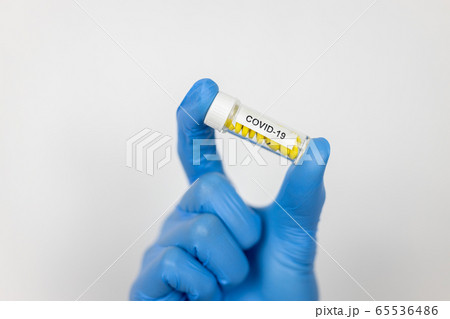 Healthcare cure concept with a hand in blue 65536486