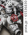 Industrial valves with red wheels. close-up  65536830