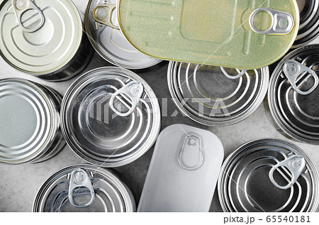 Flat lay view at various canned foods in tin cans Flat lay view at various canned foods in tin cans 65540181
