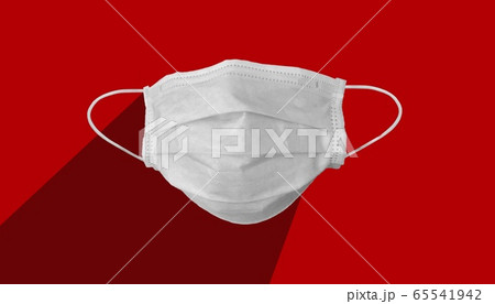 Medical mask for corona or covid-19 virus ,safety breathing masks for virus inflection,isolated on red background with long shadow, health protection concept,cover mouth to prevent virus,pollution Medical mask for corona or covid-19 virus ,safety breathing masks for virus inflection,isolated on red background with long shadow, health protection concept,cover mouth to prevent virus,pollution 65541942