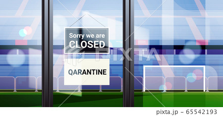 sorry we are closed sign hanging outside stadium entrance coronavirus pandemic quarantine 65542193
