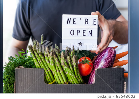 Text We're open and Fresh green and vegetables box 65543002