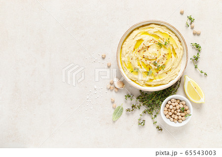 Hummus, mashed chickpeas with lemon, spices and Hummus, mashed chickpeas with lemon, spices and 65543003