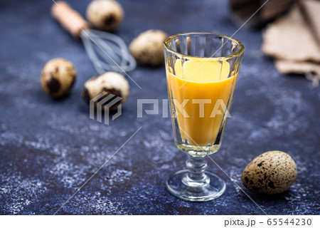 Glass of sweet egg liquor Glass of sweet egg liquor 65544230