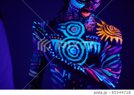 young man blur with ultraviolet body art young man blur with ultraviolet body art 65544718