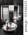 Harmonious interior design of a black room with black furniture 65546235