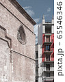 Street in the center of a European city with architecture of different eras, Spain 65546346