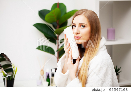 Washing face, portrait woman cleaning skin with towel. Washing face, portrait woman cleaning skin with towel. 65547168