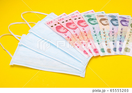 Chinese banknote (Yuan) and new white mask on Chinese banknote (Yuan) and new white mask on 65555203