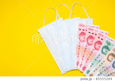Chinese banknote (Yuan) and new white mask on Chinese banknote (Yuan) and new white mask on 65555204