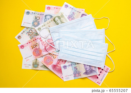 Chinese banknote (Yuan) and new white mask on 65555207