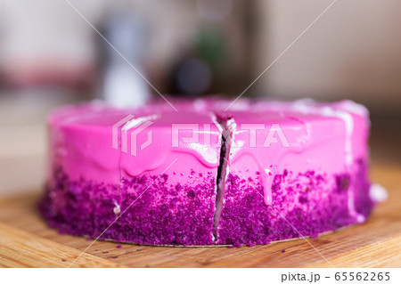 Pink and violet birthday cake. Dessert, holidays and delicious concept. Pink and violet birthday cake. Dessert, holidays and delicious concept. 65562265