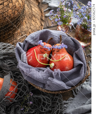 Two pears hugging each other - concept of love or care Two pears hugging each other - concept of love or care 65562574