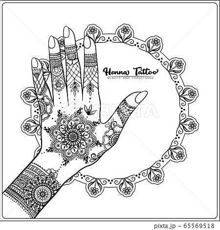 Hands with traditional indian henna tattoo. 65569518
