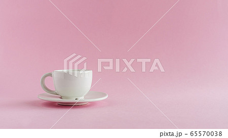 White coffee cup on pink background 65570038