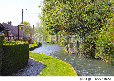 River in Normandy village 65574028