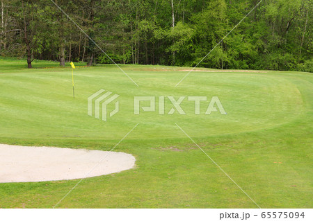 Sand bunkers on the golf course Sand bunkers on the golf course 65575094