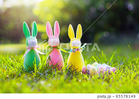 Easter bunny in face mask during virus outbreak Easter bunny in face mask during virus outbreak 65576149