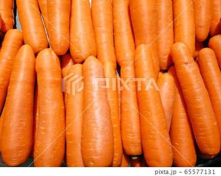 Close up of plenty fresh organic carrot. 65577131