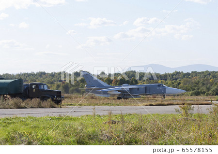 Military jet bomber Su-24 Fencer afterburner 65578155