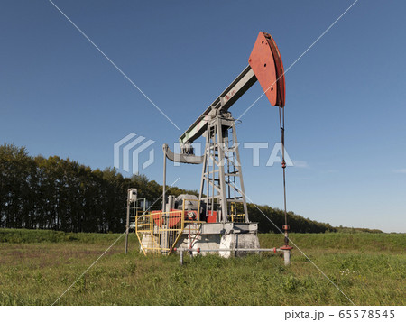 Oil pumpjack. Oil industry equipment. Oil pumpjack. Oil industry equipment. 65578545