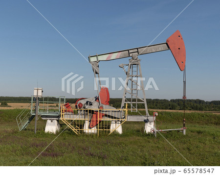 Oil pumpjack. Oil industry equipment. Oil pumpjack. Oil industry equipment. 65578547
