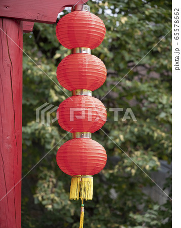 Hanging red lantern on the tree leaf background 65578662