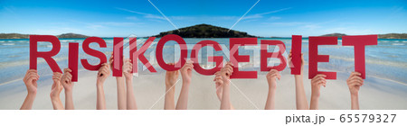 People Hands Holding Word Risikogebiet Means People Hands Holding Word Risikogebiet Means 65579327