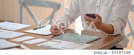 Cropped shot of professional UI developer working 65587196
