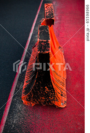 Orange dirty safety barrier. Orange dirty safety barrier. 65598966