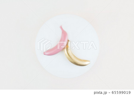 Three bananas on a background. Three bananas on a background. 65599019