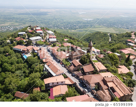 Aerial view to center Sighnaghi town and St George, Alazani valley in Georgia 65599399