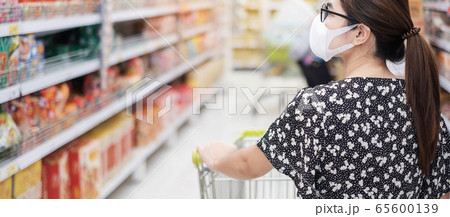 Asian woman wearing protective mask and  shopping 65600139
