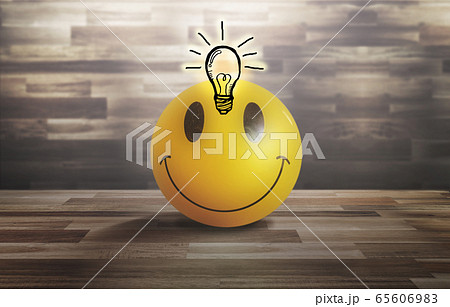 笑顔のかわいいスマイルボールのひらめきの表情の写真素材