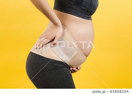 Cropped image of pregnancy belt dressed on Cropped image of pregnancy belt dressed on 65608284