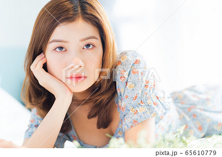 Beautiful woman, bedroom, morning 65610779