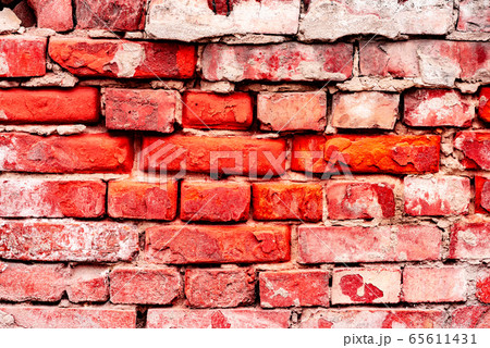 Texture of a brick wall with cracks and scratches 65611431