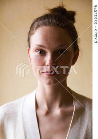 Close up face of young pretty girl without makeup Close up face of young pretty girl without makeup 65612046