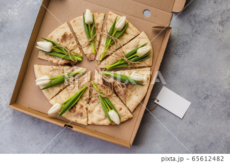 creative pizza with flowers tulips in paper box creative pizza with flowers tulips in paper box 65612482
