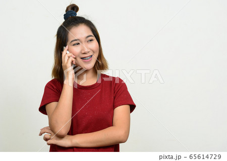 Portrait of young Asian woman with short hair Portrait of young Asian woman with short hair 65614729