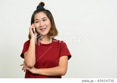 Portrait of young Asian woman with short hair Portrait of young Asian woman with short hair 65614730