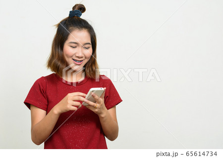 Portrait of young Asian woman with short hair Portrait of young Asian woman with short hair 65614734