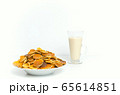 Trendy pancake cereal meal with milk on white background. Tiny baked pancakes. Breakfast food. 65614851