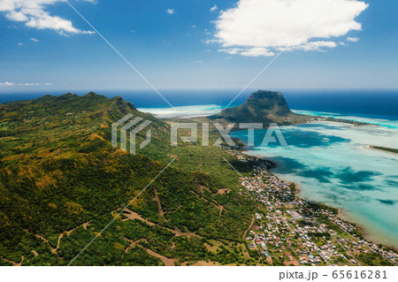 Aerial view of Le Morne Brabant mountain which is in the World Heritage list of the UNESCO Aerial view of Le Morne Brabant mountain which is in the World Heritage list of the UNESCO 65616281