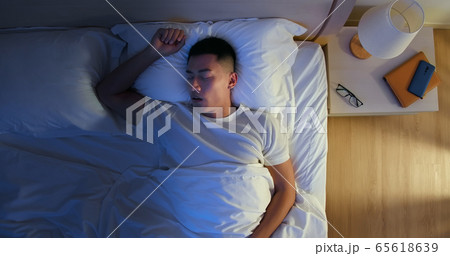 Man Snores At Night 65618639