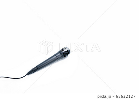 Black microphone on white background 65622127