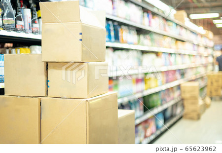 Empty carton in the stainless trolley at Supermarket aisle preparing for arrange put on the shelves for customer to buy for hoarding food 65623962