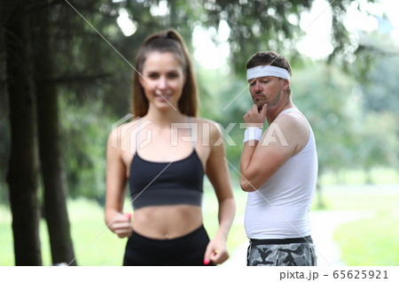 Smiling charming lady running Smiling charming lady running 65625921